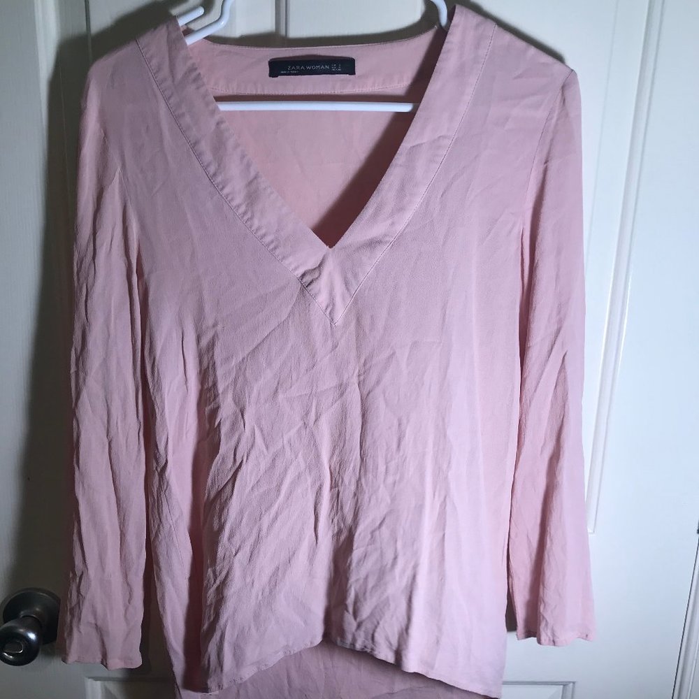 pink flowy shirt